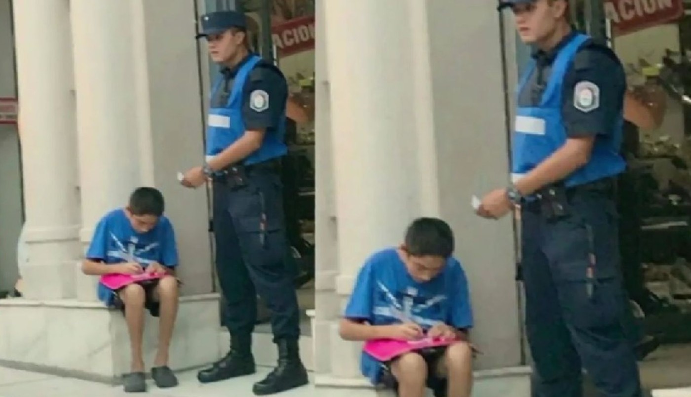 Viral emocionante: la foto de un policía que ayuda a estudiar a un nene en la calle | Redes