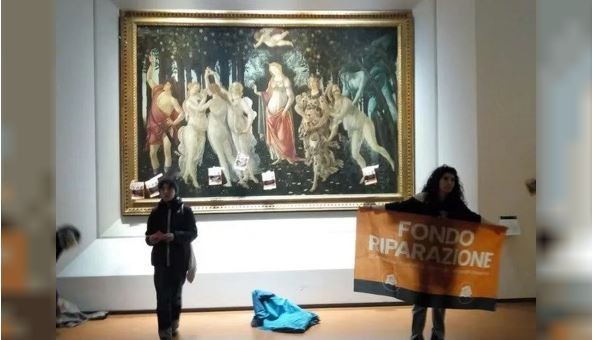 Activistas climáticos pegaron carteles en la mampara que protege el cuadro La Primavera de Botticelli | Internacionales