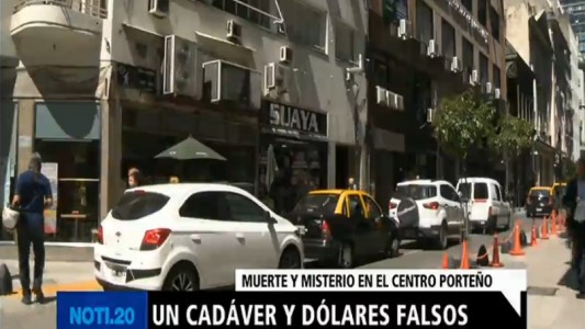 Hallaron un cadáver y dólares falsos en una oficina en el microcentro porteño