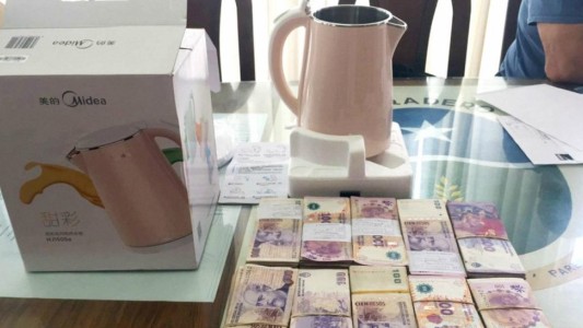 Un comerciante chino intentó sobornar a una intendenta: le dio 100 mil pesos en una pava