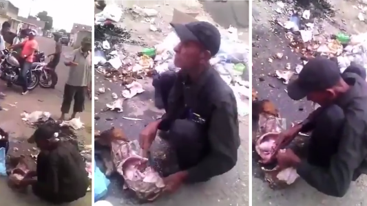 Video impactante: grabaron a un hombre descuartizando a un perro en plena calle de Venezuela para poder comer