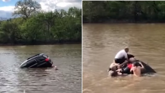 Dramático rescate de una mujer que cayó con su camioneta al río