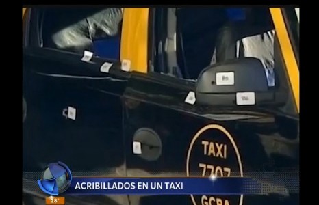 Acribillados en un taxi