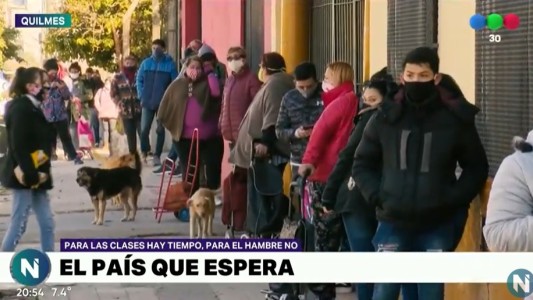 Quilmes: largas colas en una escuela para recibir alimentos