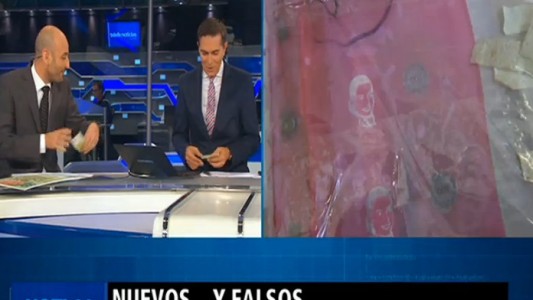 Billetes nuevos y falsos