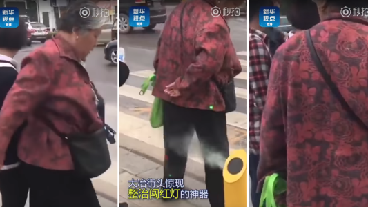 Gran idea: en una ciudad de China mojan a los peatones que no respetan los semáforos