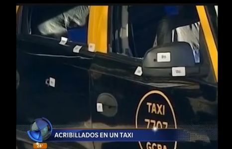 Acribillados en un taxi