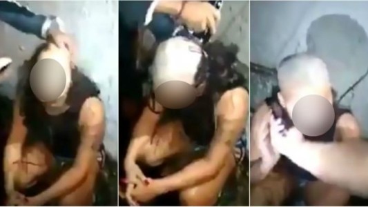 Video: un sicario brasileño le afeitó la cabeza a su novia en "castigo" por ser infiel