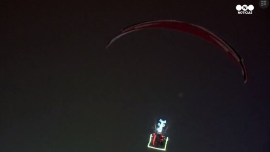 Papá Noel en trineo con paracaídas