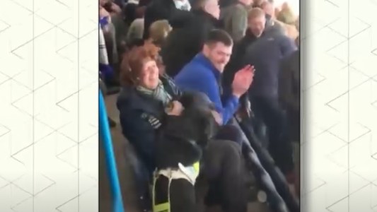 En la cancha, con el perro guía