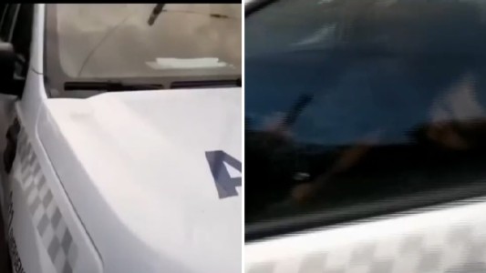 Grabaron a policías durmiendo en el patrullero