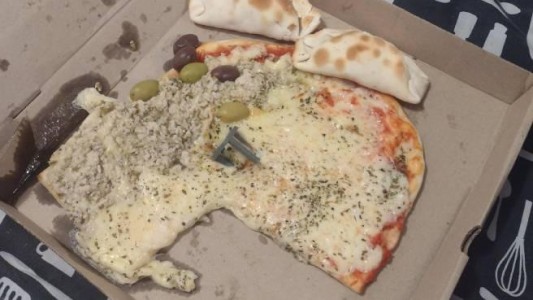 Pidió una pizza y le llegó con una porción menos: las razones que dio el restaurante