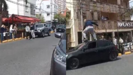 Le sacaron la licencia de conducir al hombre que se subió al capot de un auto en una discusión de tránsito