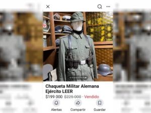 Vendía uniformes nazis por Market Place: allanaron su domicilio, que tenía pisos con insignias esvásticas